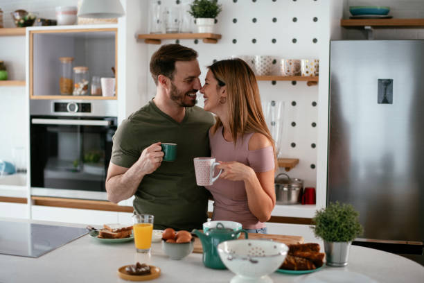 istock Young couple making sandwich at home. 1284679827