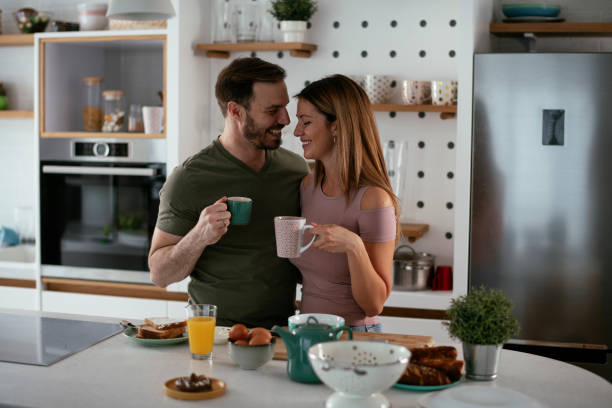 istock Young couple making sandwich at home. 1284679828