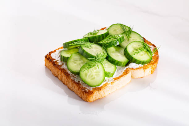 istock Cheese and cucumber sandwich with vegetable and toasted bread 1284681323