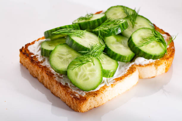 istock Cheese and cucumber sandwich with vegetable and toasted bread 1284681736