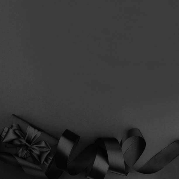 istock Black friday sale background with gift 1284685064