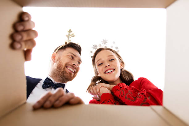 istock happy couple opening christmas gift box 1284685255