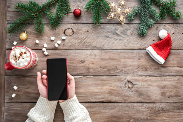 istock Christmas concept with smartphone 1284685497