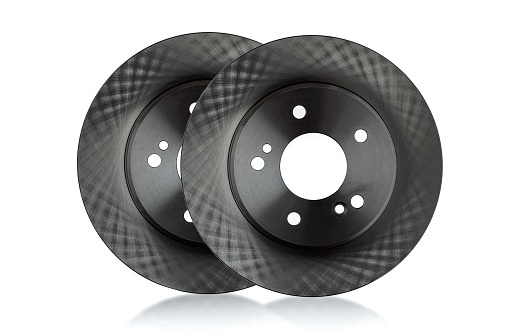 Stack of brake disks isolated on white background. 3d render