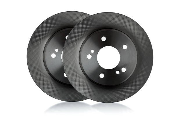 два новых тормозных диска на белом - part of vehicle brake disc brake pad isolated стоковые фото и изображения