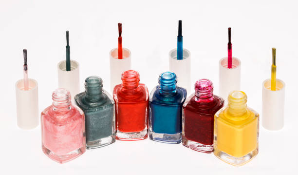 istock colored glass nail polish bottles 1284687592