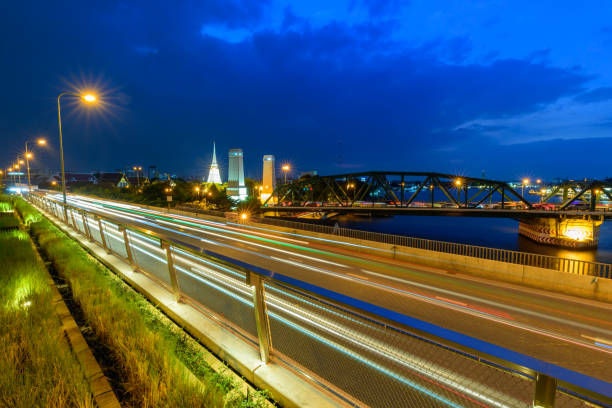istock blur light traffic at junction / blurry traffic light in the city 1284688678