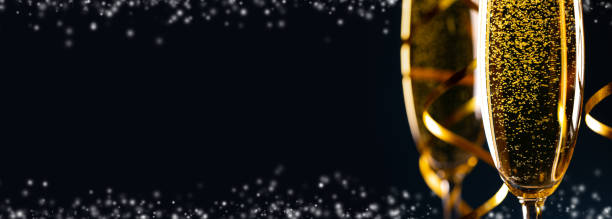 istock Two glasses of champagne 1284688681