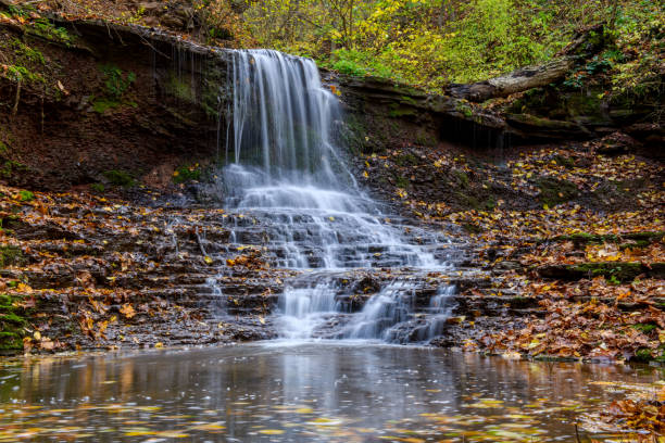 istock Colorful majestic waterfall in national park forest during autumn 1284689104
