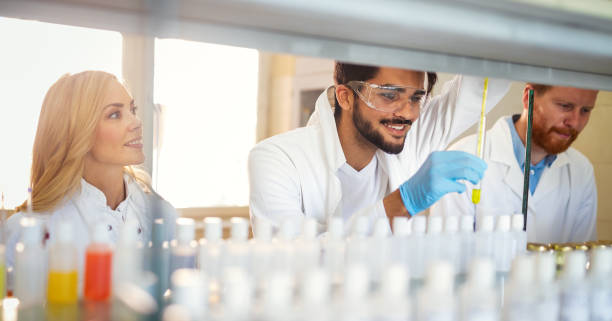 istock Young scientists, students of chemistry working in laboratory 1284690071