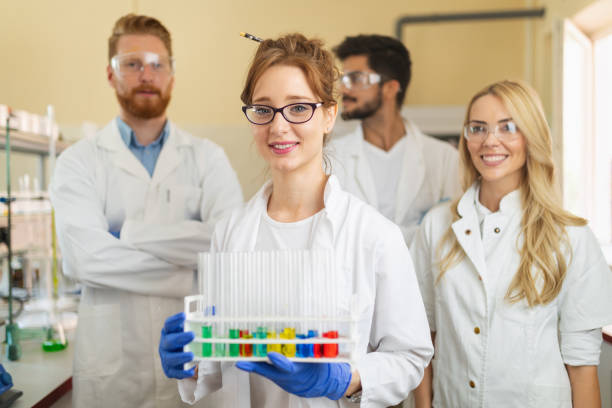 istock Young scientists, students of chemistry working in laboratory 1284690127