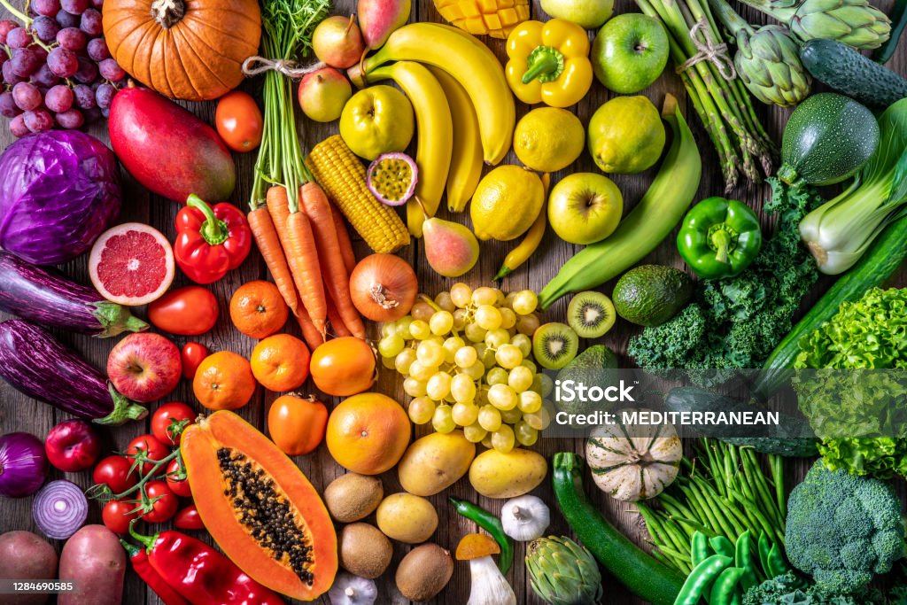 Colorful vegetables and fruits vegan food in rainbow colors Colorful vegetables and fruits vegan food in rainbow colors arrangement full frame Fruit Stock Photo