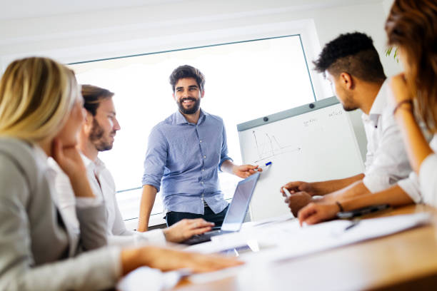 istock Business team people discussing documents and ideas at meeting 1284691358