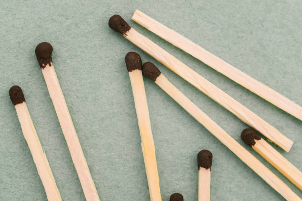 istock Whole matches close-up on a green background. Top view, flat lay 1284693185