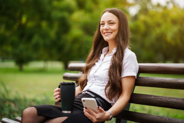 istock Businsswoman in park 1284693355