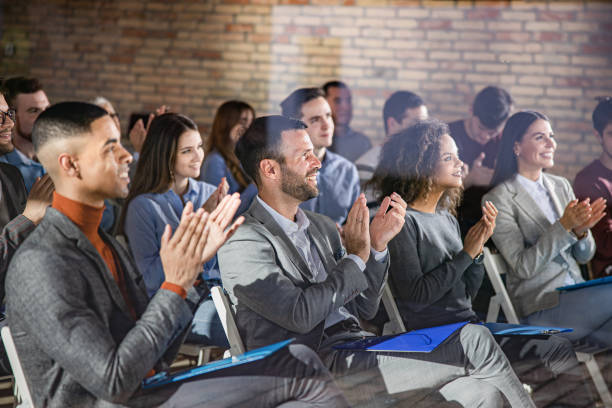 istock Congratulating on successful business seminar! 1284696129
