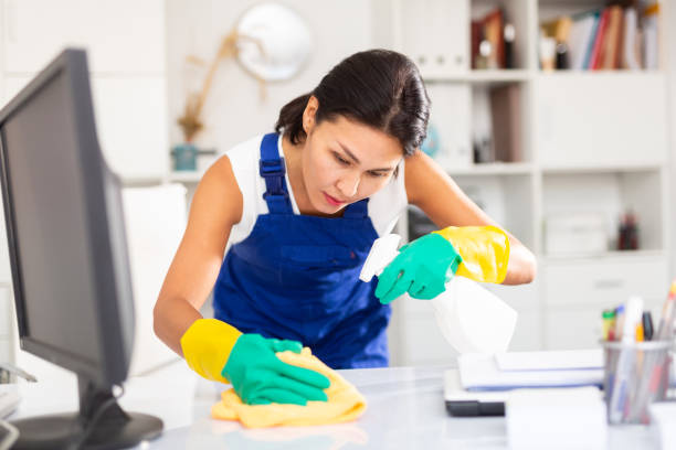 istock Female cleaner working productively on task 1284696586