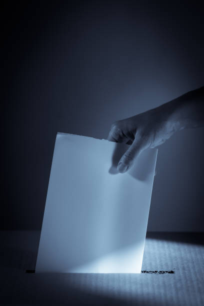 istock Conceptual image of a person voting during elections 1284698220