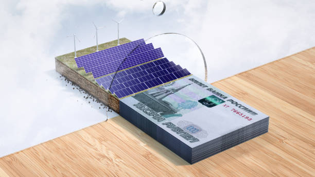 российский кредит на возобновляемые источники энергии - solar energy currency energy green стоковые фото и изображения