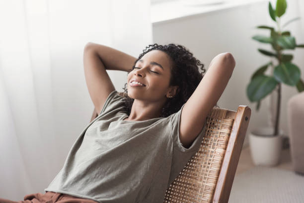 istock Relaxed young woman resting at home 1284701535
