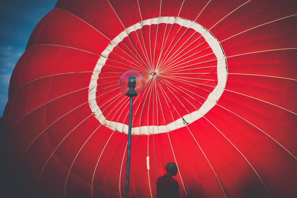 istock Man in front of air balloon 1284702794