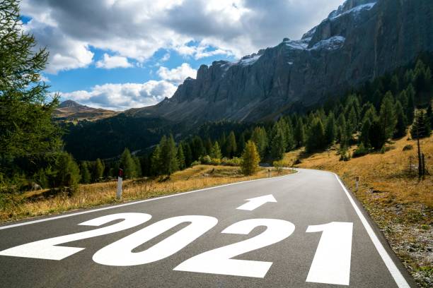 istock 2021 New Year road trip travel and future vision concept . 1284703689