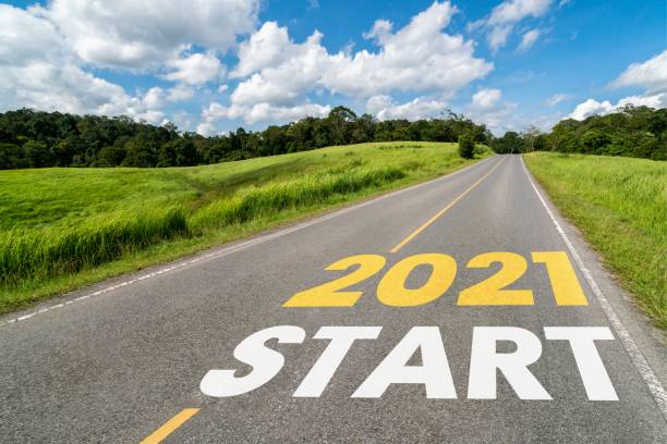 istock 2021 New Year road trip travel and future vision concept . 1284704191