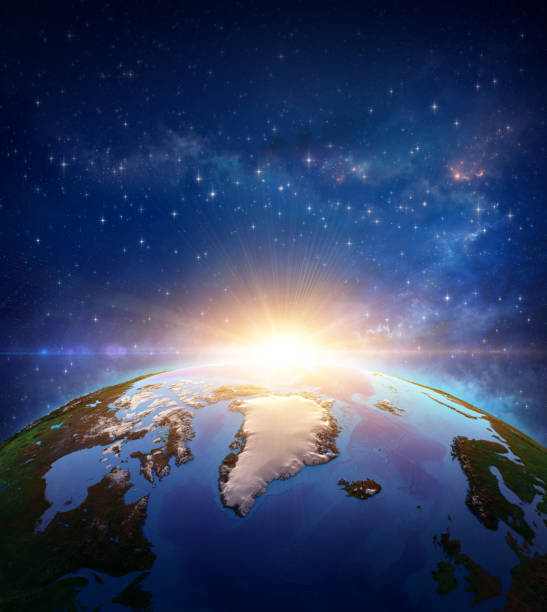istock Sun shining over North Pole and Arctic Ocean from space 1284704219
