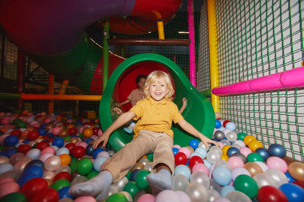 istock Children playing in indoor playground 1284705015