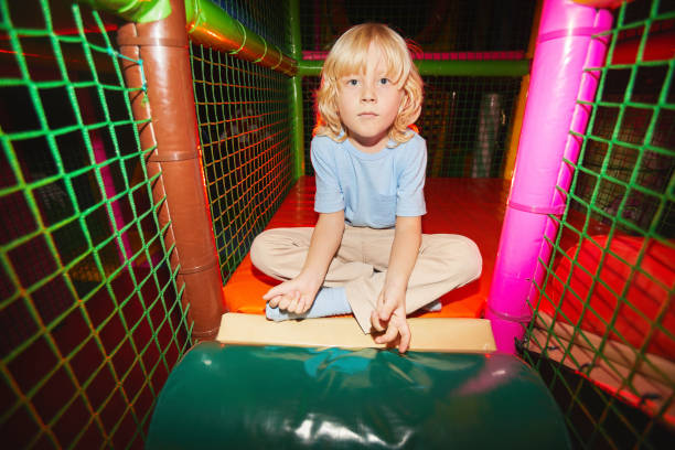 istock Boy in play center 1284705091