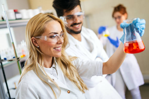 istock Group of students working at the laboratory 1284708891