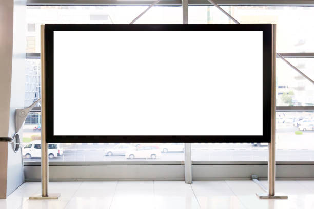 istock Advertisement mockup. Blank empty billboard inside a shopping mall or metro underground in Dubai, UAE. 1284709124