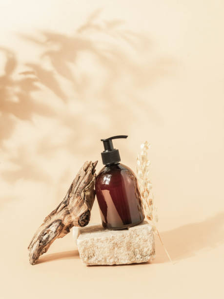 istock Stone podium and brown cosmetic bottle 1284709417