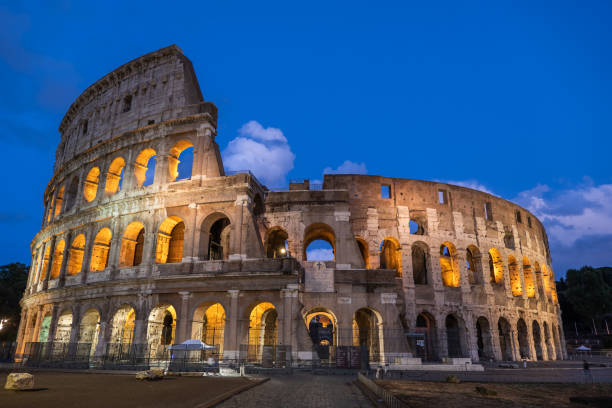 istock Colosseum Amphitheatre In Rome By Night 1284710222