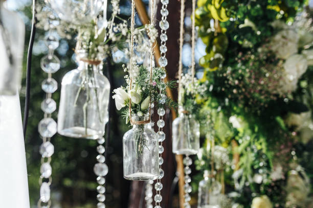 istock The wedding arch is decorated with beautiful decorative bouquets in jars 1284711697