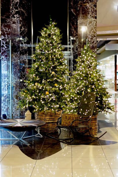 istock Christmas tree with lights and a rocking chair 1284713031