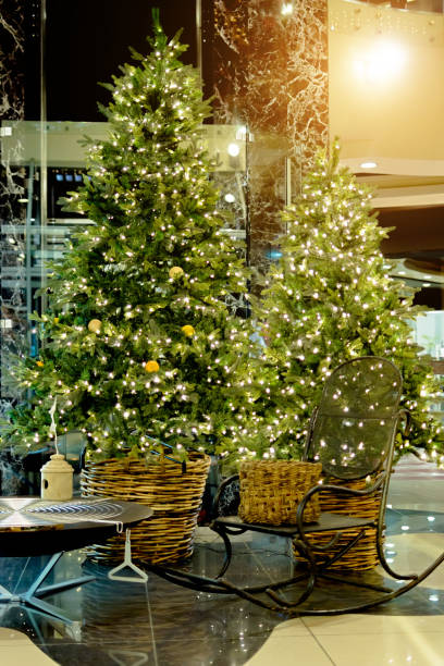 istock Christmas tree with lights and a rocking chair 1284713033