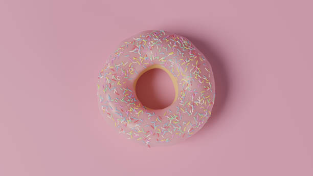 istock Pink Doughnut with white sprinkles in still life on pink background. Top view. 3D Illustration 1284713089