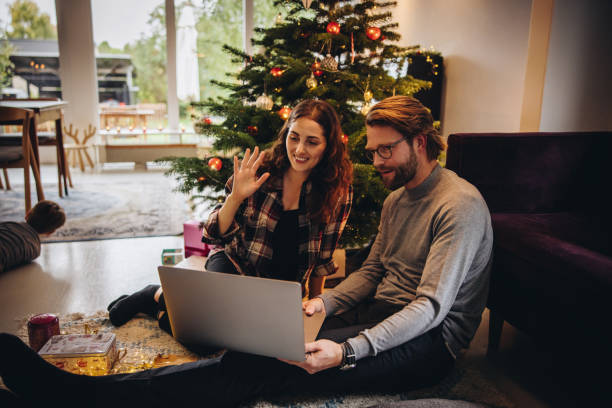 istock Christmas video chatting with family 1284715327