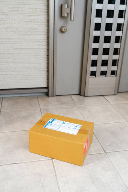 istock Package delivered to a doorstep via contactless delivery 1284715672
