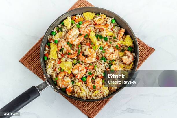 Shrimp Fried Rice In A Skillet Directly Above Horizontal Photo Stock Photo - Download Image Now