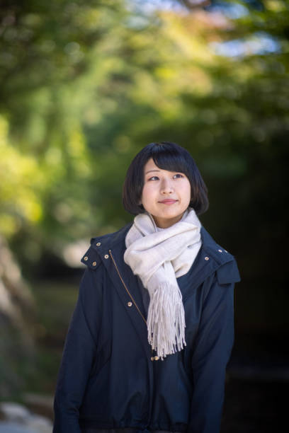 istock Young woman walking in forest in sightseeing location 1284719302