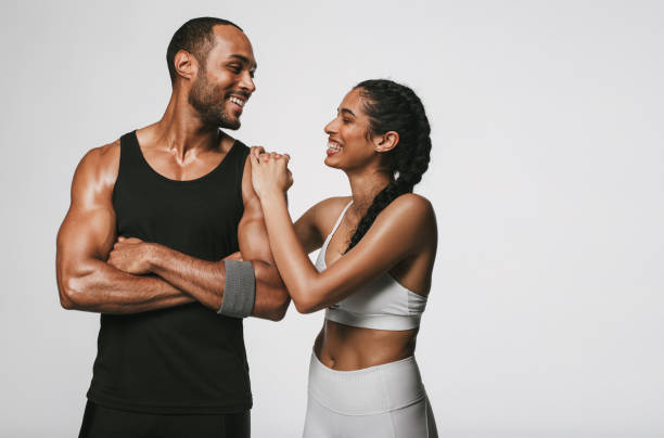 istock Fit couple relaxing after workout 1284720366