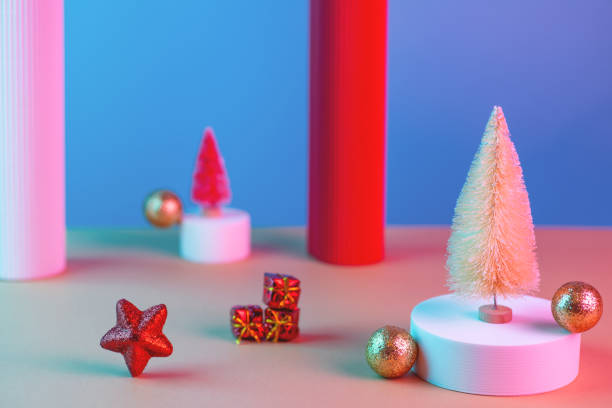 istock New Year composition with Christmas trees, star, columns, balls and catwalks on a blue background 1284722156