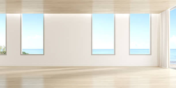 istock 3d render of empty room with wooden floor and large plain wall on sea background. 1284723325