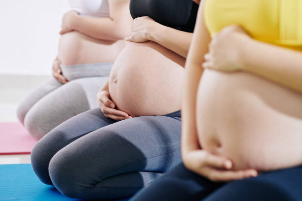 istock Pregannt women attending yoga class 1284723427