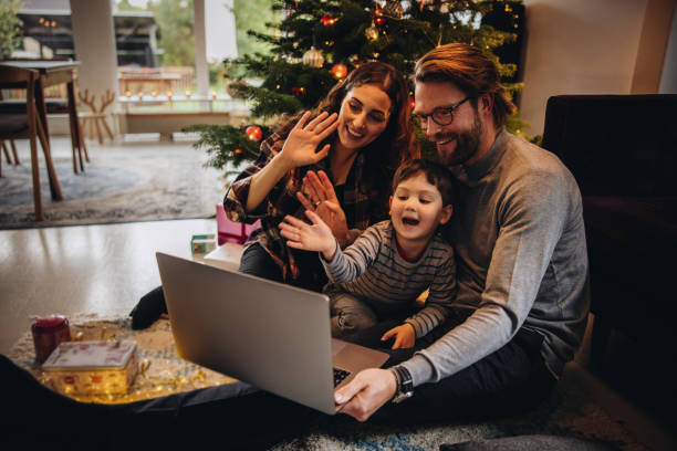 istock Family having a video call during christmas. 1284724864