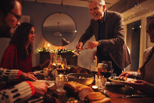 istock Family having Christmas dinner together 1284724969