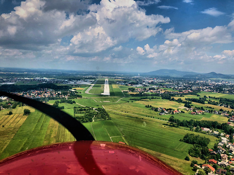 Aproaching the runway strip of the airport Salzburg in Austria June 10,2018