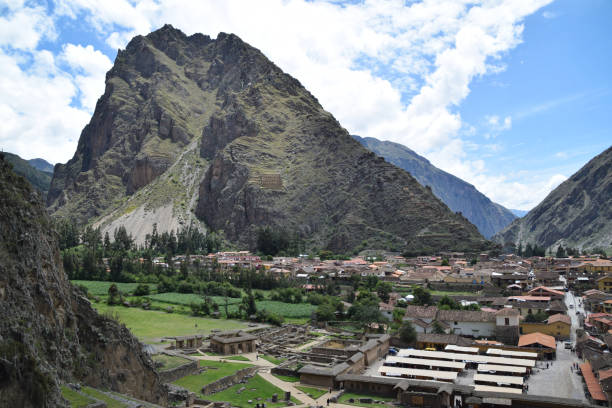 istock Ollantaytambo town surrounded by mountains in Peru 1284728869